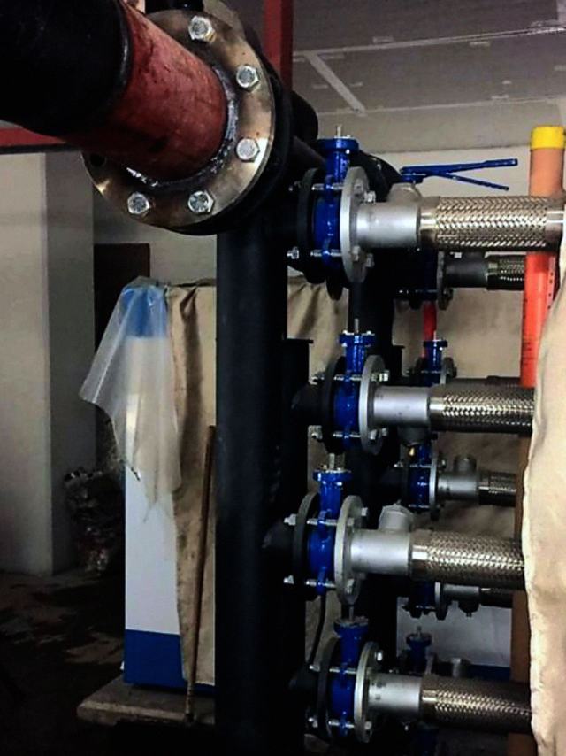 Pipework and valve set in a plant room