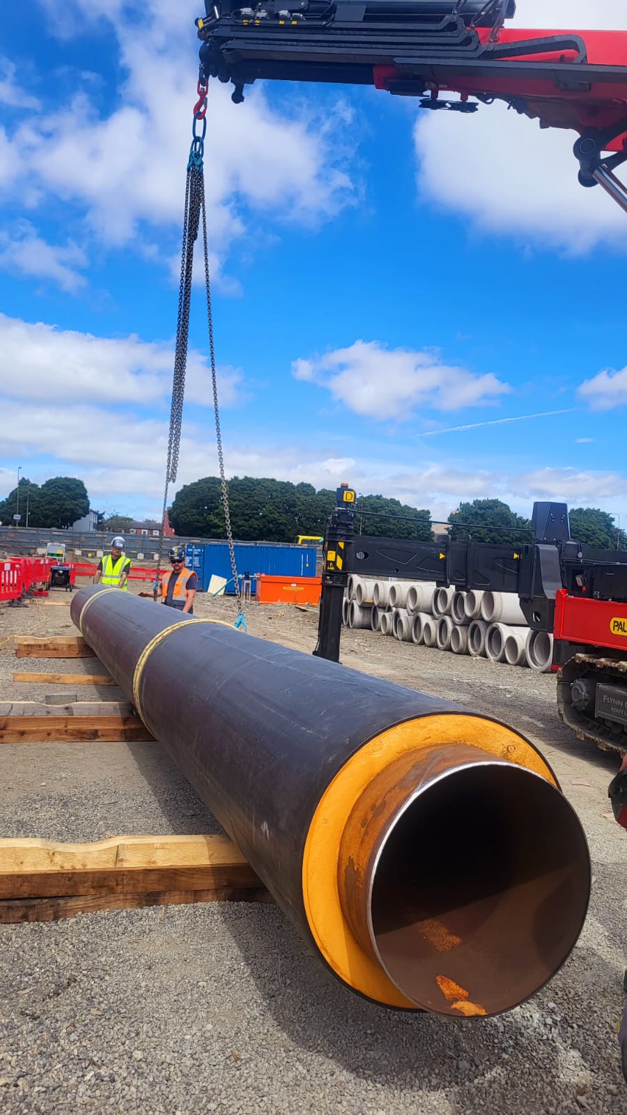Pipeline section being lifted into position on site